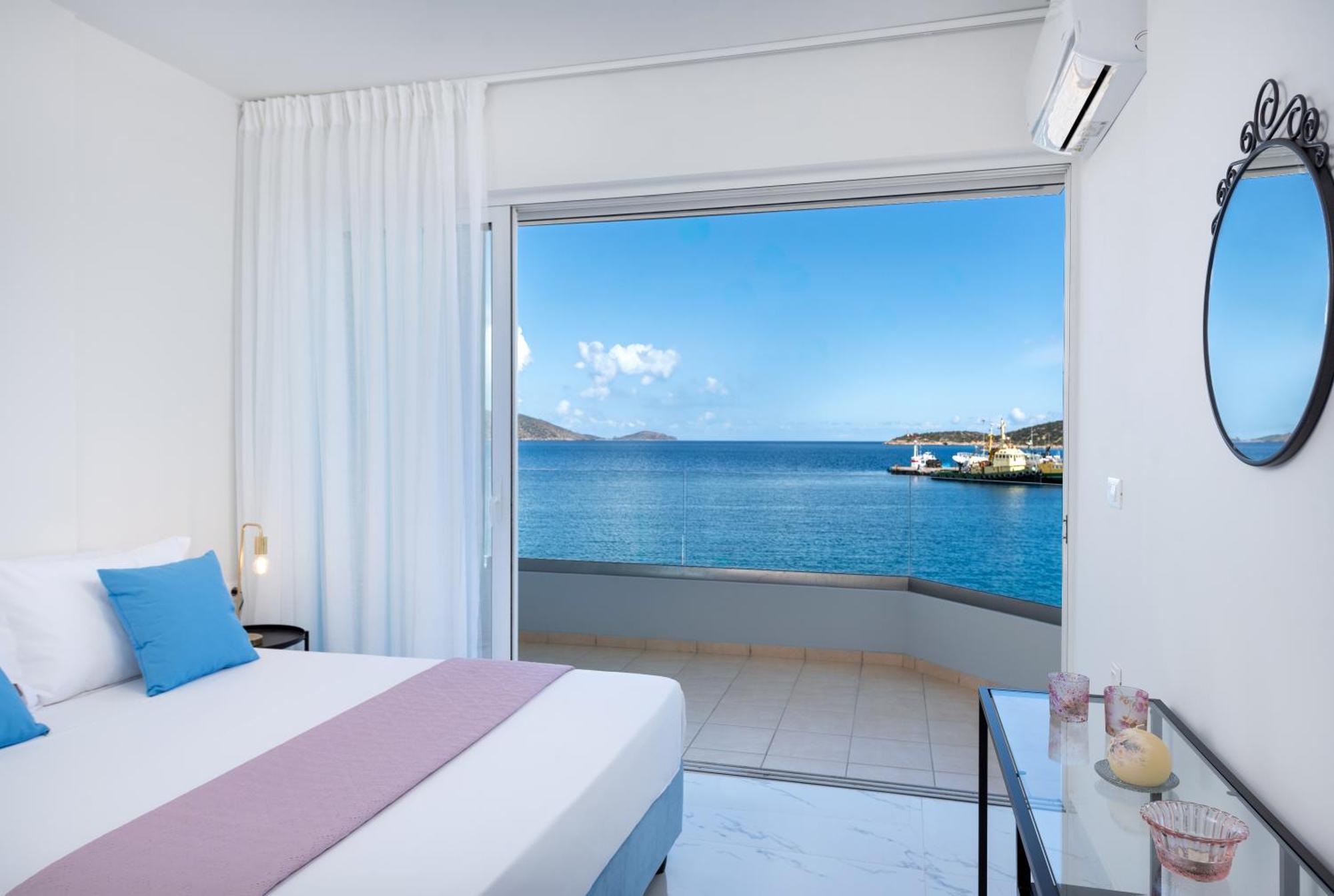 Sea View Bliss 2Br Agios Getaway Apartment อายิโอสนิโกลาโอส ภายนอก รูปภาพ
